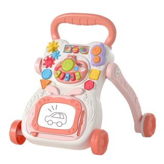 Chodzik pchacz edukacyjny interaktywny różowy